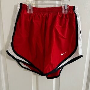 Women’s Nike dri fit shorts. Size XS. Red, black, and white.